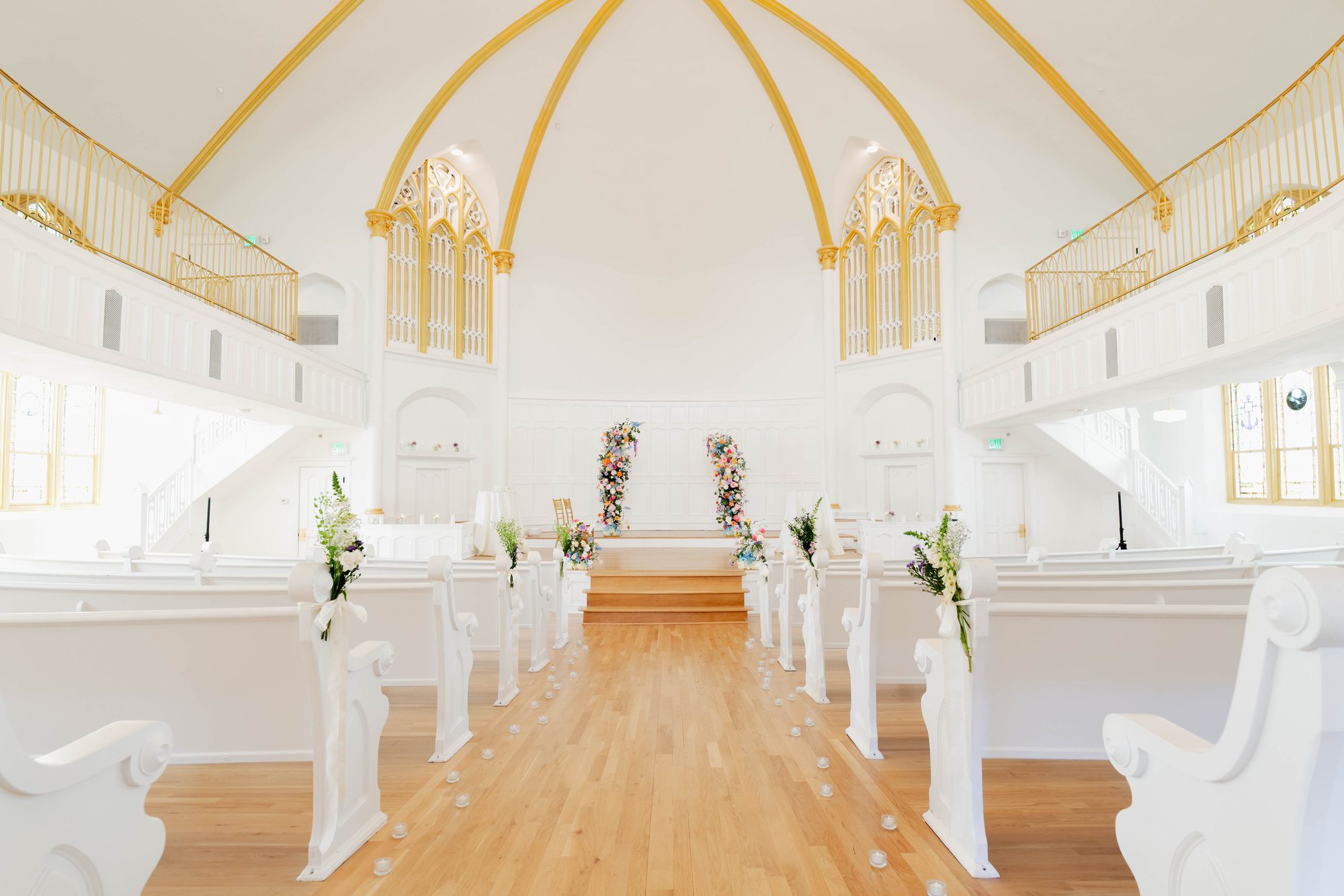 Guests seated for a church wedding at Melrose Abbey in midtown Kansas City